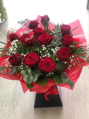 12 red roses and gypsophila